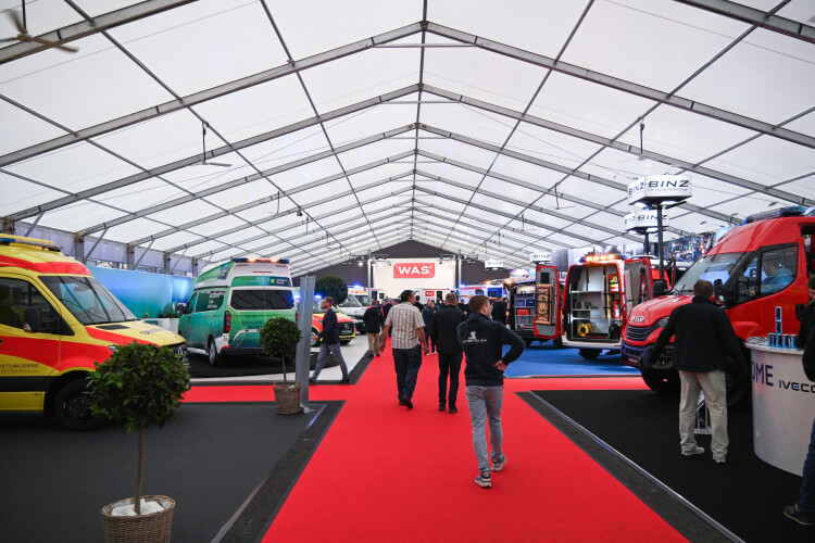 A hall at the RETTmobil trade fair with emergency vehicles